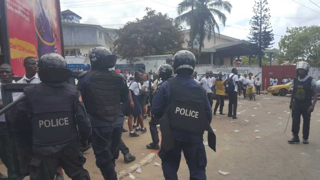 Liberia police supressing protest Image fair use