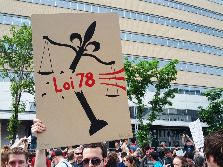 Placard against emergency law 78. Photo: Christian Aubry