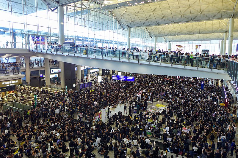 HK airport sit in protest Image Wpcpey