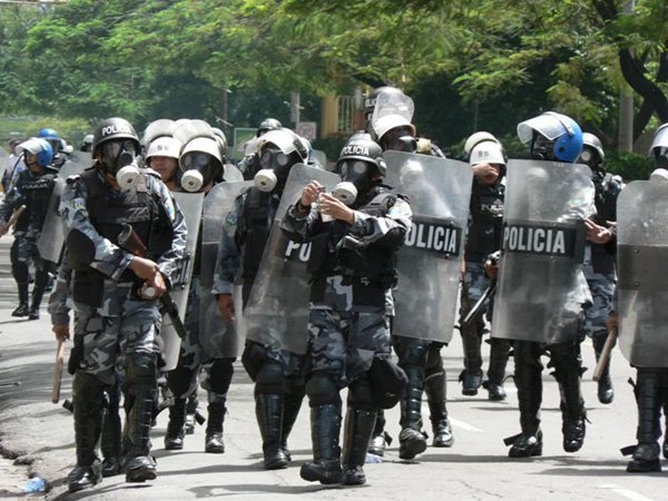 Police forces repressing a demonstration on October 7. Photo by G. Trucchi.