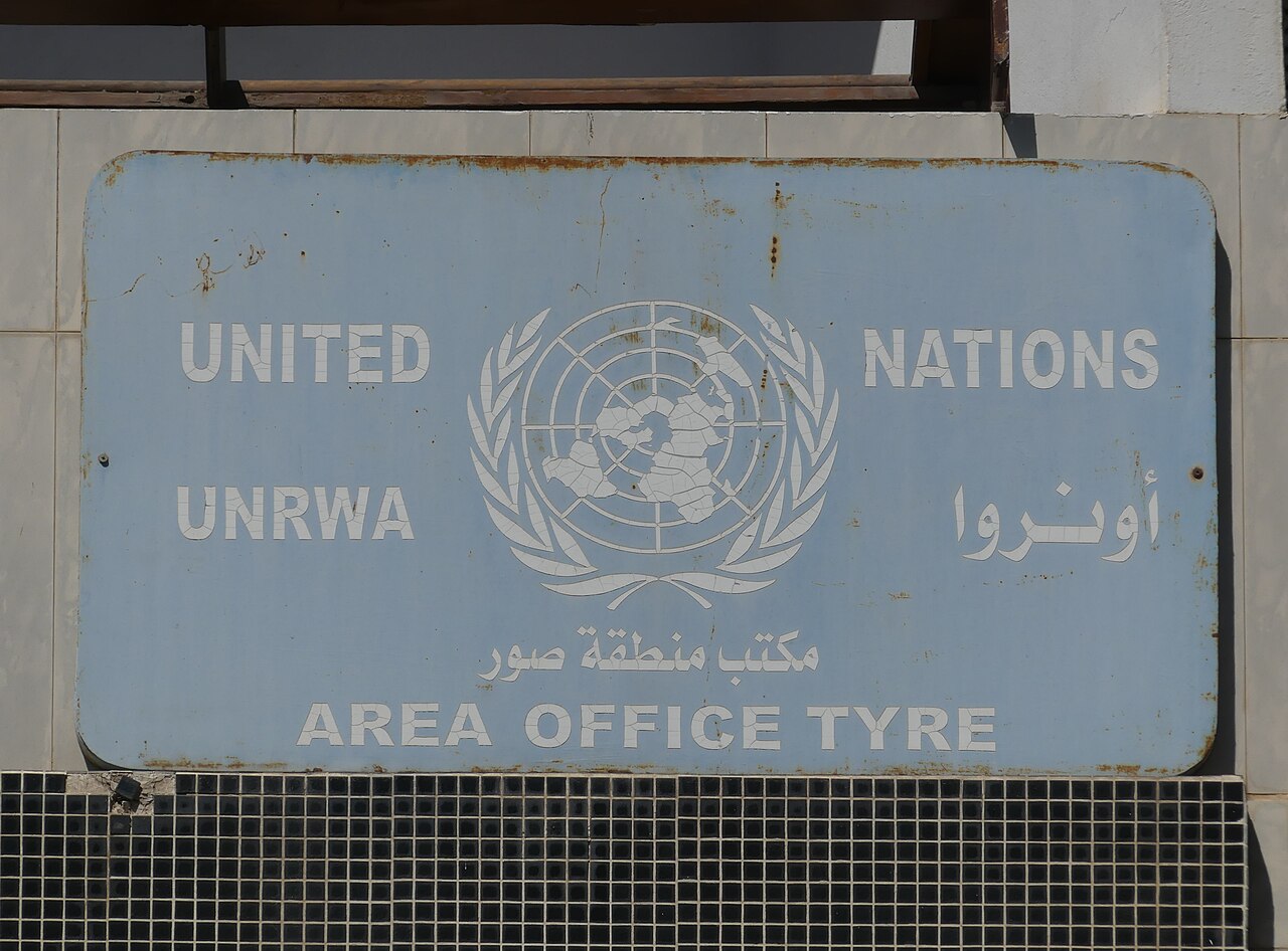 UNRWA sign Image RomanDeckert Wikimedia Commons