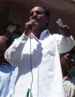 Rashid Shah delivering speech. He was later arrested by the authorities