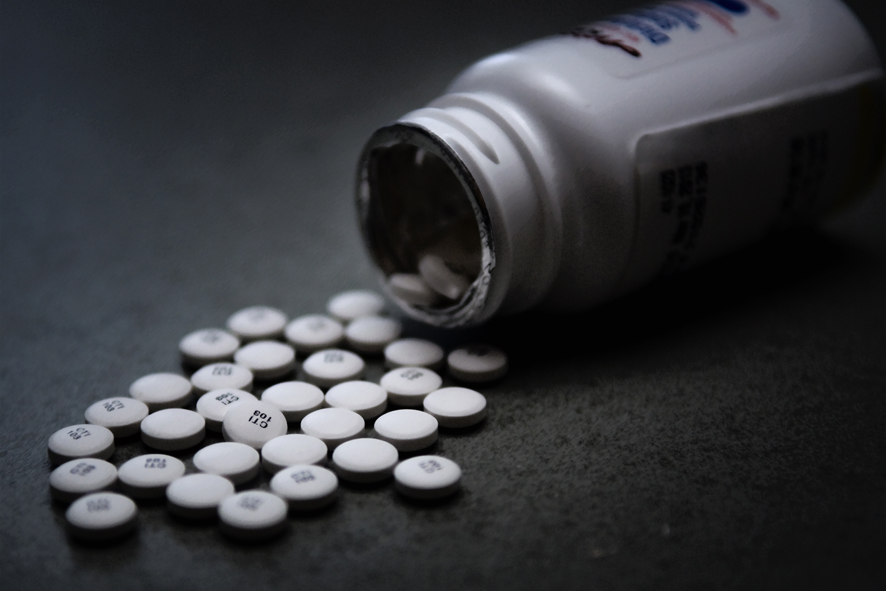 Prescription pain pills are seen dumped out on a table at Grissom Air Reserve Base, Ind. Airmen who take prescription pills that are not their own or are taken after the time allotted could find themselves facing severe discipline. (U.S. Air Force photo illustration/Tech. Sgt. Mark R. W. Orders-Woempner) 