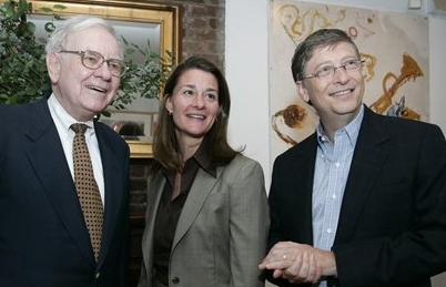 Warren Buffett with Melinda and Bill Gates