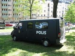 Black Swedish riot police car
