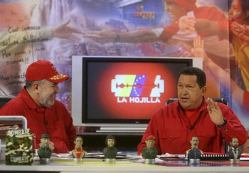 Mario Silva (left), presenter of La Hojilla, together with President Chavez. This photograph was taken during another edition of Silva's famous TV show.