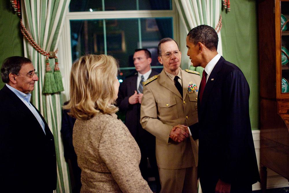 Obama shakes hand with admiral, after announcing Bin Laden's death. Photo: Pete Souza/ White House