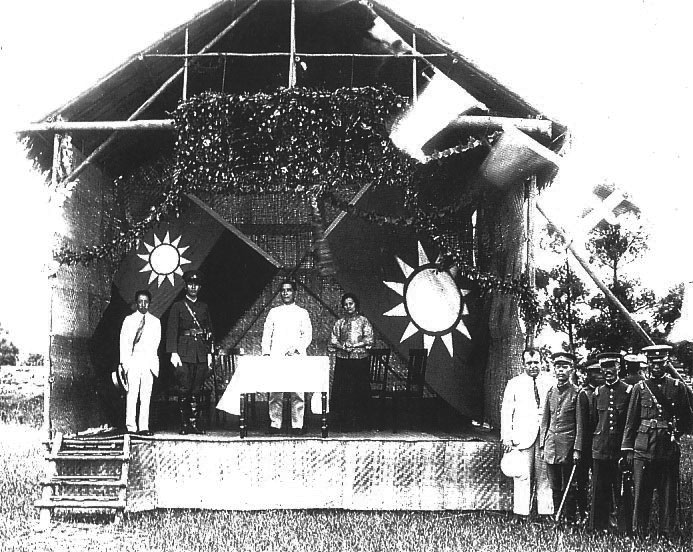 Whampoa academy, with Chiang Kai-Chek (uniform) and Sun Yat Sen (behind table)