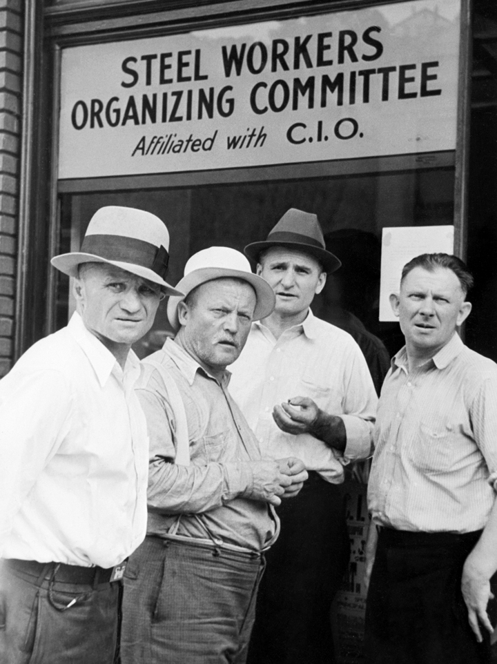 Pennsylvania --- 1938-Pennsylvania:  Pennsylvania Steel workers in front of CIO Headquarters. --- Image by © Bettmann/CORBIS