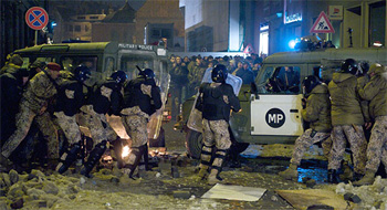 Clashes with police in Latvia during a demonstration against the policy of cuts by the right wing government.